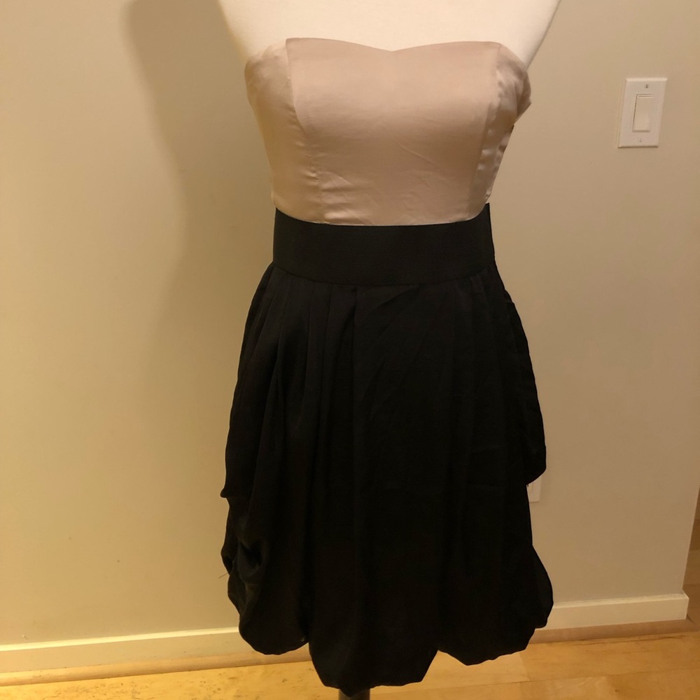 Strapless satin party dress with pockets